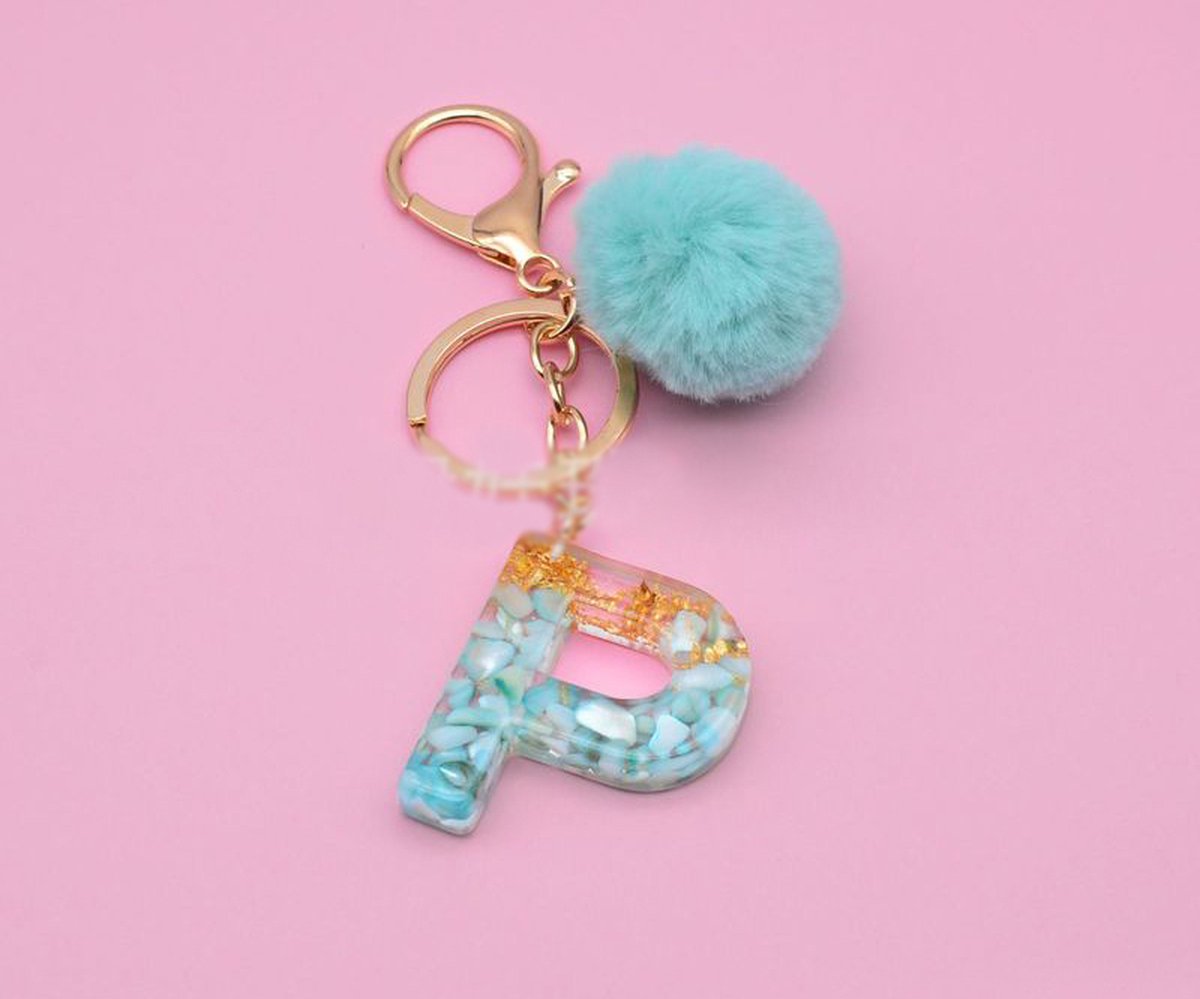 Sleutelhangers of voor je tas van A tot Z - met een pompon of kwastje - met letter - mooi design - handgemaakt - sleutelhangers - design - mode - goud - zwart - blauw - roze- rood