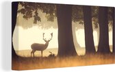 Canvas Schilderij Hert - Bomen - Bos - 40x20 cm - Wanddecoratie
