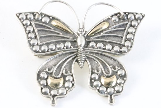 Zilveren vlinder broche met 18k gouden decoraties