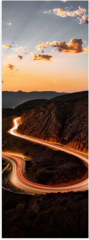 WallClassics - Poster (Mat) - Verlichte Weg over Berg met Zonsondergang - 20x60 cm Foto op Posterpapier met een Matte look