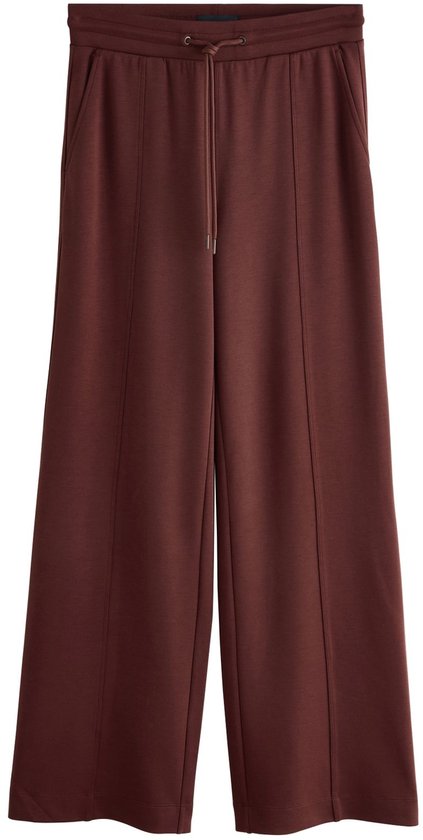 Bruine joggingbroek met wijde pijpen, opgestreken, met trekkoord.