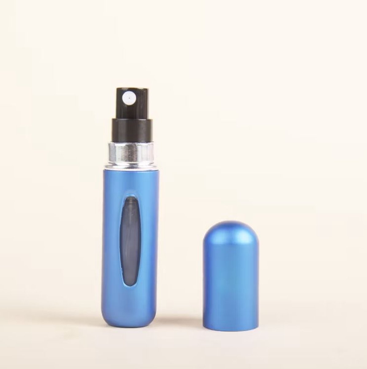 Parfumflesje - Navulbaar - Reisparfum - Verstuiver - Refillable - Hervullen - Travel perfume atomizer - Lipstick formaat - 5 ml - Parfum to go - Compacte spray - Handbagage - Donkerblauw - Jonyx