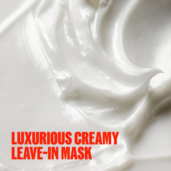 Close-up van een luxe romige witte leave-in masker.