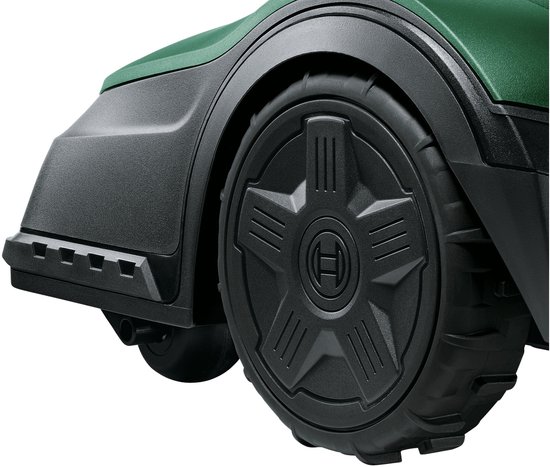 Detailopname van de grote, zwarte, ster-vormige wiel van een Bosch robotmaaier.