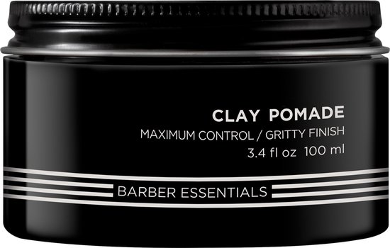 Zwarte pot met 'Clay Pomade Maximum Control / Gritty Finish'.