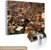 MuchoWow® Glasschilderij 120x80 cm - Schilderij acrylglas - Een impressief beeld van de grootste favela van Rio de Janeiro - Foto op glas - Schilderijen