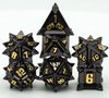 Afbeelding van het spelletje Black with Golden Font Metal dice (Pinwheel)