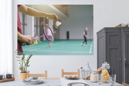 Canvas schilderij 150x100 cm - Wanddecoratie Een man staat op het punt om te badmintonnen - Muurdecoratie woonkamer - Slaapkamer decoratie - Kamer accessoires - Schilderijen op canvas