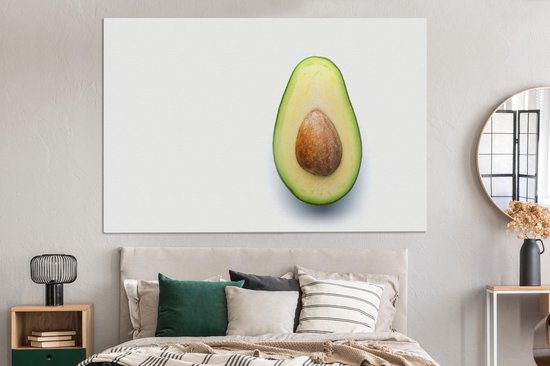 Canvas schilderij 150x100 cm - Wanddecoratie Gesneden avocado met pit - Muurdecoratie woonkamer - Slaapkamer decoratie - Kamer accessoires - Schilderijen op canvas