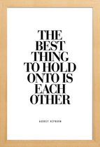 JUNIQE - Poster met houten lijst The Best Thing To Hold Onto Is Each