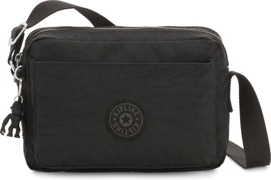 Zwarte Kipling schoudertas met een rond Kipling-logo, een ritsvak en een aapje-sleutelhanger.