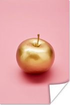 Stilleven van een gouden appel op een roze achtergrond poster papier 60x90 cm - Foto print op Poster (wanddecoratie woonkamer / slaapkamer)