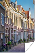 Gezellige straat in de Nederlandse stad Haarlem Poster 20x30 cm - klein - Foto print op Poster (wanddecoratie woonkamer / slaapkamer) / Europese steden Poster