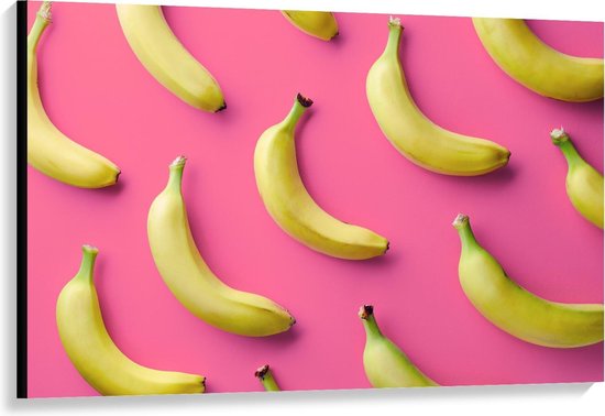 Canvas  - Bananen bij Roze Achtergrond - 120x80cm Foto op Canvas Schilderij (Wanddecoratie op Canvas)