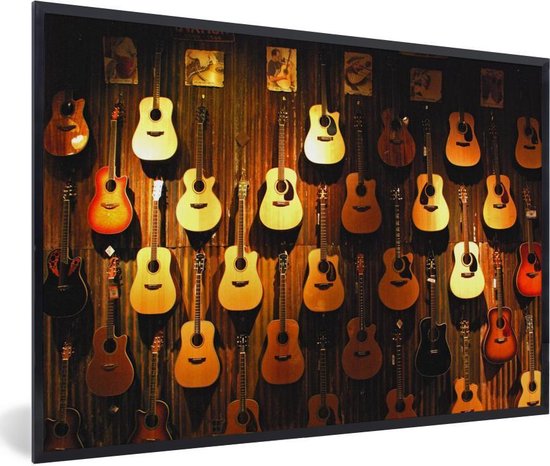 Fotolijst incl. Poster - Veel akoestische gitaren hangen aan een muur - 90x60 cm - Posterlijst