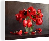 Canvas Schilderij Verwelkte en vervaagde rode tulpen - 30x20 cm - Wanddecoratie