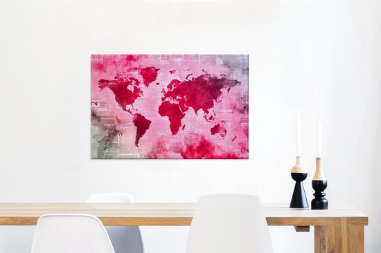 Wereldkaart avec peinture rose vif sur fond avec journal 90x60 cm