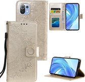 Voor xiaomi mi 11 lite totem bloem reliëf horizontale flip tpu + pu lederen tas met houder & kaartsleuven & portemonnee (goud)