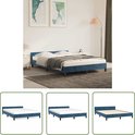 Structure de lit en velours bleu foncé avec tête de lit et matelas, avec sommier à lattes en bois.