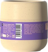 FOAMIE Conditioner Concentraat, paarse band met ingrediëntenlijst, streepjescode en keurmerken.