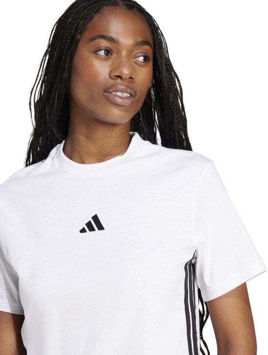Damestrui, wit, met zwart Adidas logo op de borst en zwarte strepen op de zijkant.