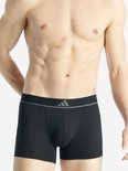 Zwarte Adidas boxershorts met grijze tailleband, logo op de voorkant en 'AEROREADY' op de zijkant.