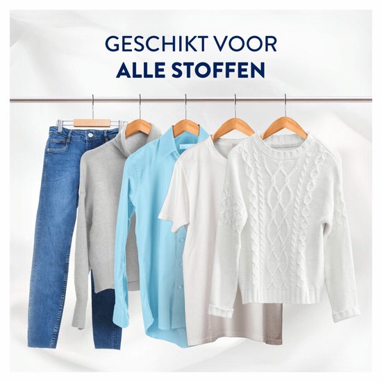 Linge de couleurs variées, y compris jeans, pulls et chemises, suspendu sur un portant. "Convient à tous les tissus."