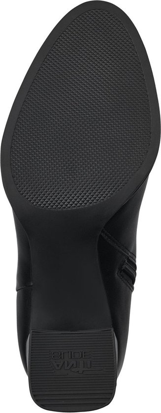 Semelle de botte en cuir noir avec talon bloc et profil antidérapant.