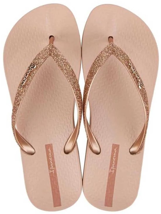 Roze Ipanema teenslippers met glitterbandjes.