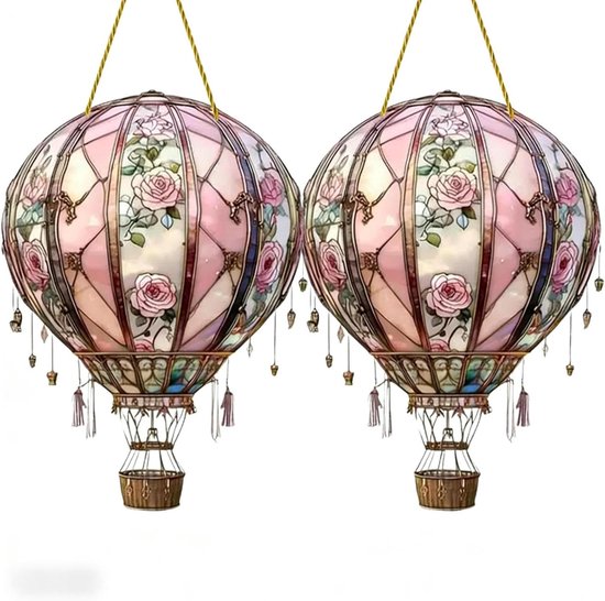 Twee lichtroze Tiffany-stijl luchtballonlampen met bloemenpatroon, hangend.