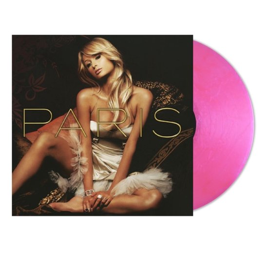 Paris vinyl lp met roze gemarmerde schijf, hoes met Paris Hilton in witte jurk op donker gedecoreerde achtergrond.