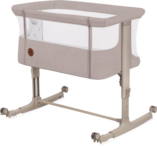 Beige co-sleeper met gaaspanelen, een print van paardenbloemen en verstelbare hoogte.