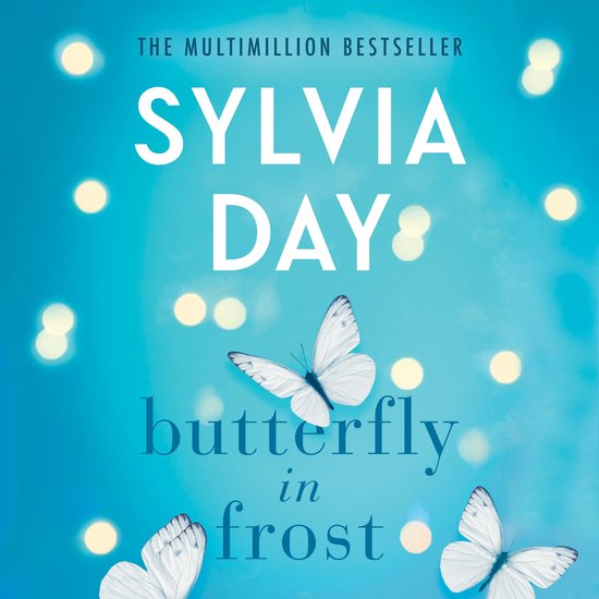 Boekcover van "Butterfly in Frost" door Sylvia Day, met witte vlinders en een blauwe, lichtgevende achtergrond.