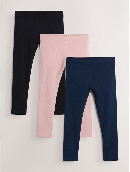 Drie meisjesleggings: zwart, lichtroze en donkerblauw.
