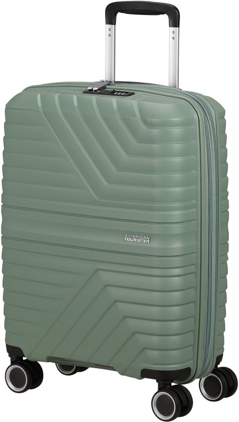 Lichtgroene koffer van American Tourister met trolleygreep en vier wielen. De koffer heeft een gestreept patroon.