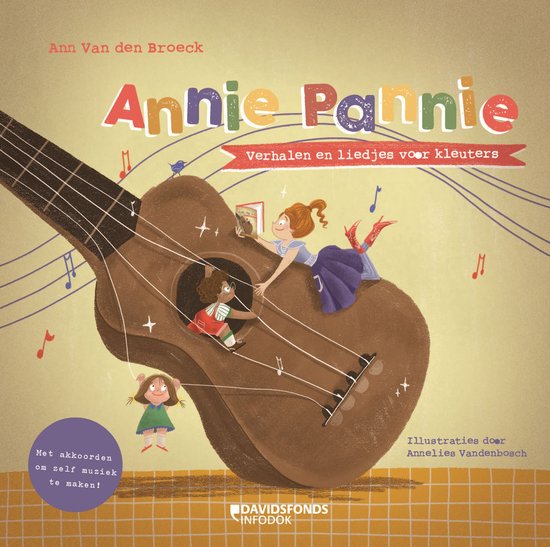Boek 'Annie Pannie' met illustraties van een gitaar met kinderen erop. Met teksten: 'Annie Pannie', 'Verhalen en liedjes voor kleuters', 'Met akkoorden om zelf muziek te maken!', 'Illustraties door Annelies Vandenbosch', 'Davidsfonds Infodok'.
