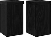 Twee zwarte houten plantenstandaards met eikennerfstructuur.