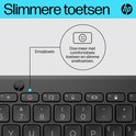 Gros plan sur le clavier HP avec une touche emoji.