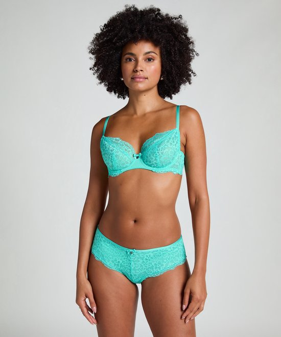 Mannequin vue de face portant un soutien-gorge et un slip brésilien turquoise avec des détails en dentelle et un nœud.