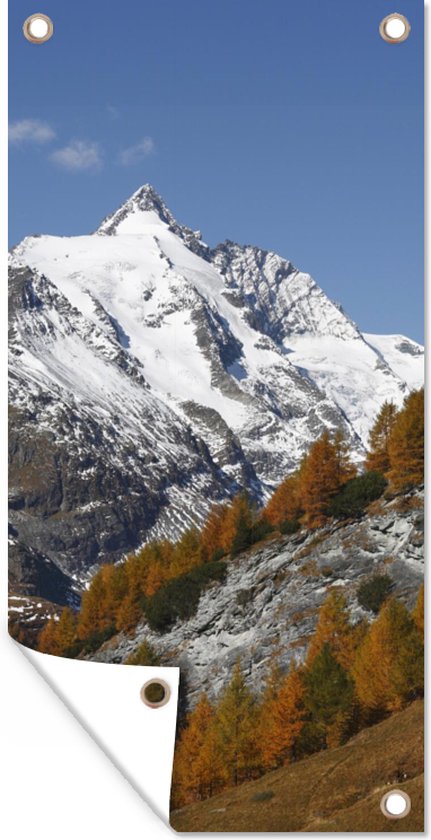 Schuttingposter De hoogste berg tijdens de herfst in het Park Hohe Tauern in Oostenrijk - 100x200 cm - Tuindoek