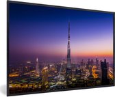 Fotolijst incl. Poster - Kleurrijke lucht boven de wolkenkrabber de Burj Khalifa en Dubai - 120x80 cm - Posterlijst