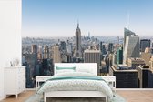 Behang - Fotobehang uitzicht over Manhatten en de Empire State Building - Breedte 360 cm x hoogte 240 cm