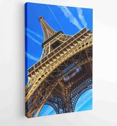 Canvas schilderij - Paris Eiffel Tower in Paris, France. Eiffel Tower is one of the most iconic landmarks in Paris. Architecture and landmarks of Paris. -  Productnummer 1536803819