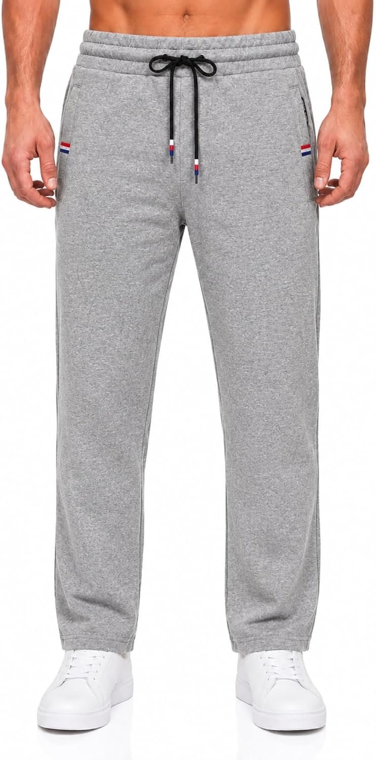 Trainingsbroek voor Heren. Lange Trainingsbroek. Elastische Trainingsbroek met Verstelbaar Koord en Zakken met Ritssluiting.