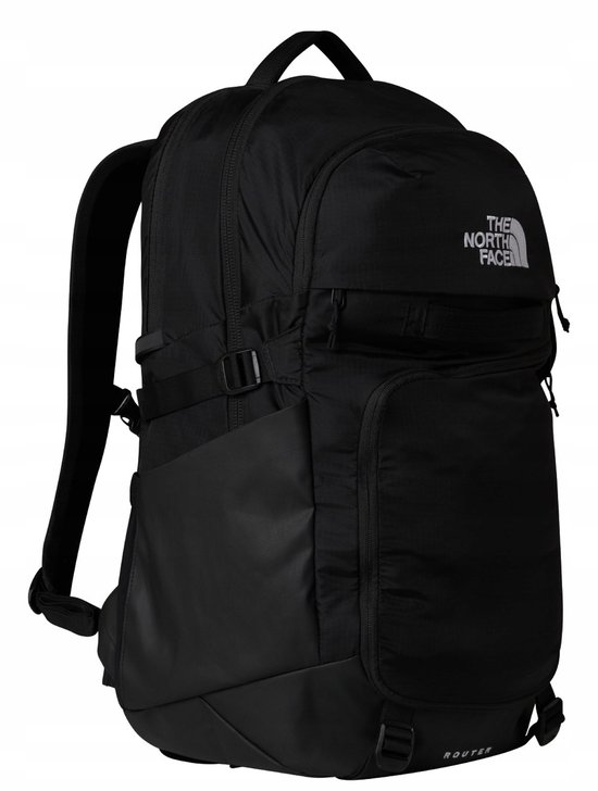 Zwarte The North Face rugzak met 'Router' logo, een grote voorzak en zijvakken.