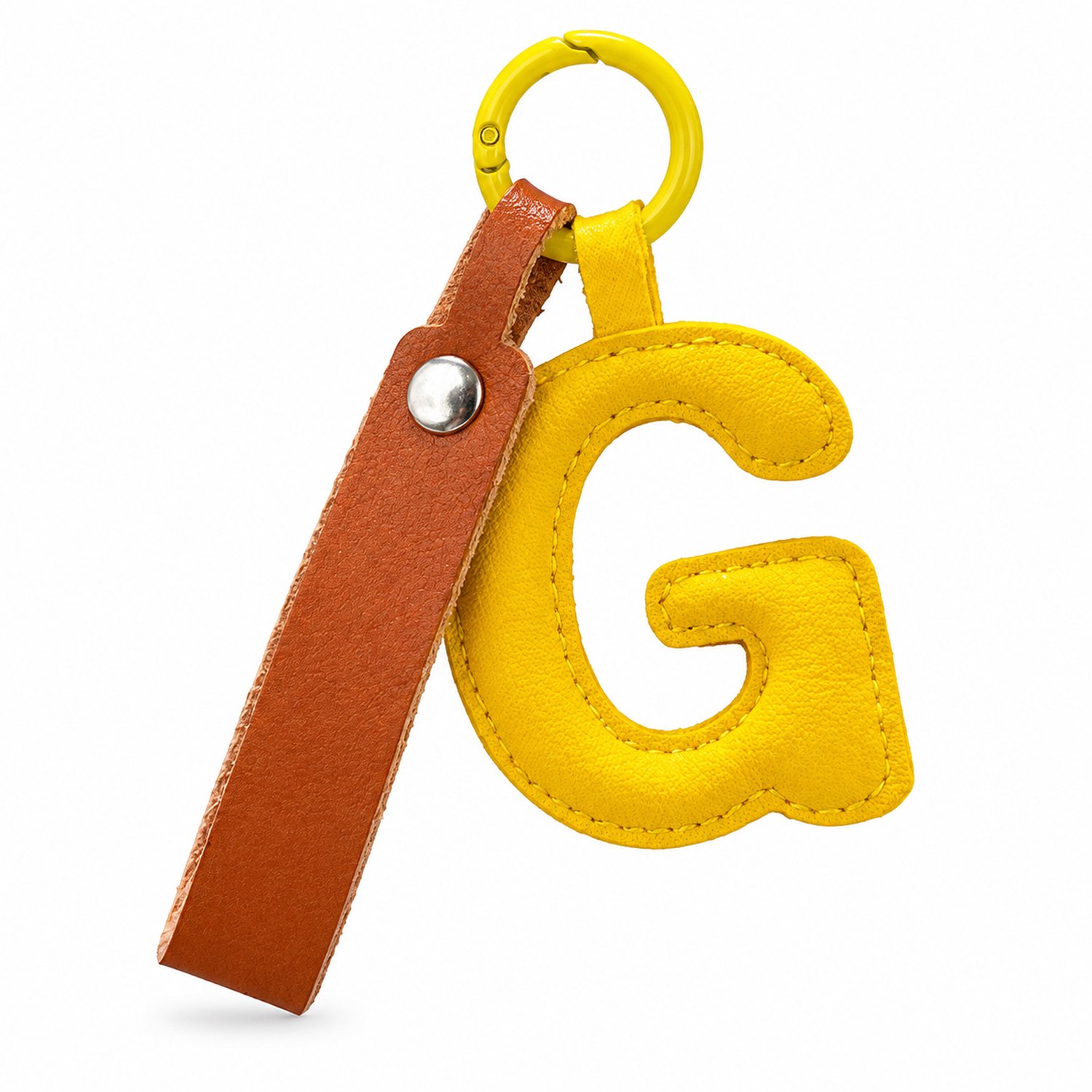 Sleutelhanger van leer met letter G, geel met bruine band en ronde sleutelring, voor sleutels en tassen, individueel verpakt