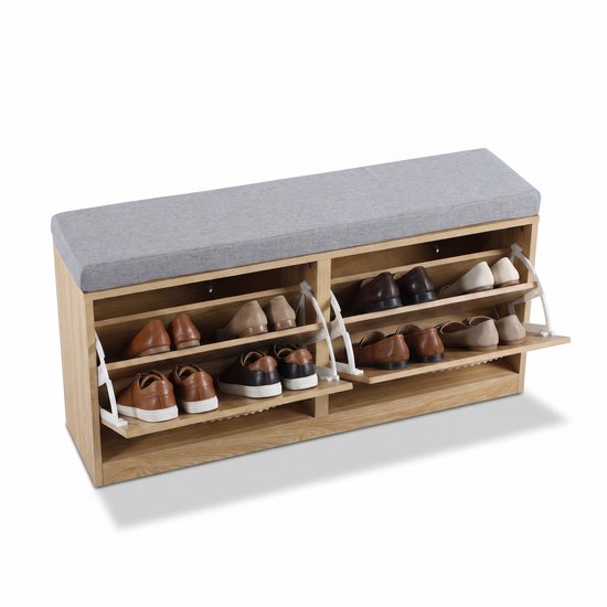 Eikenhouten schoenenbank met grijs zitkussen, twee deuren wijd open met diverse schoenen erin opgeborgen.