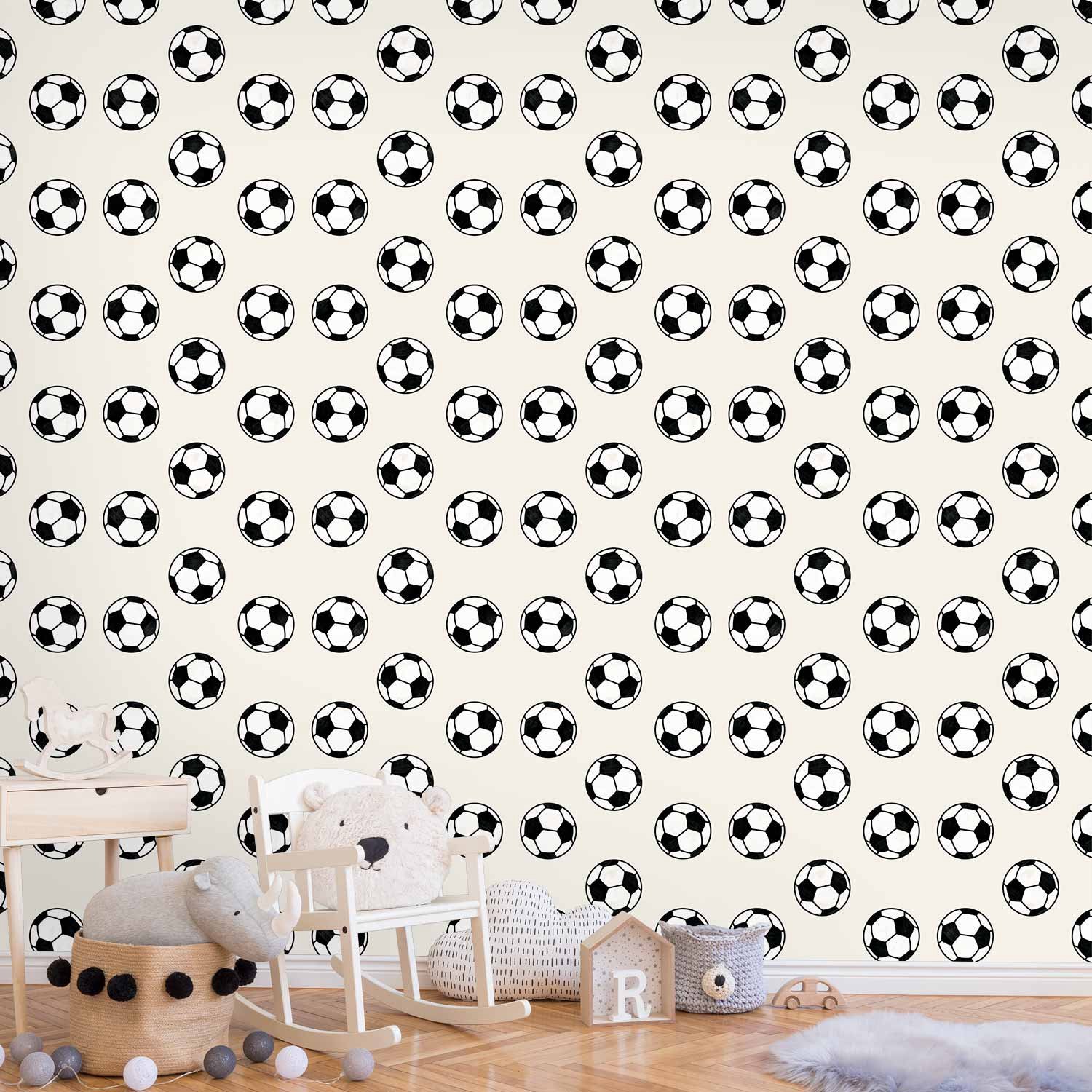 Behang - Soccer - Symmetrical black-and-white soccer balls on a beige background.