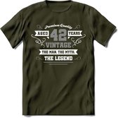42 Jaar Legend T-Shirt | Zilver - Wit | Grappig Verjaardag en Feest Cadeau | Dames - Heren - Unisex | Kleding Kado | - Leger Groen - XXL