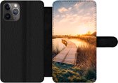 Bookcase Geschikt voor iPhone 11 Pro telefoonhoesje - Zonsondergang in de Nederlandse polder - Met vakjes - Wallet case met magneetsluiting